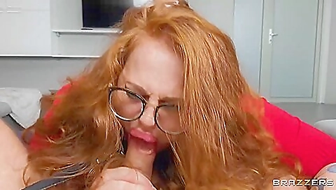Redheaded redhead is on top of a dick as she fucks