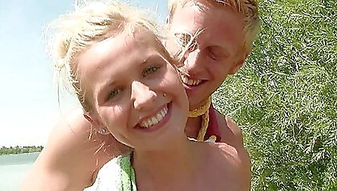 Hottie blonde in sexy outfit riding a dildo outdoors