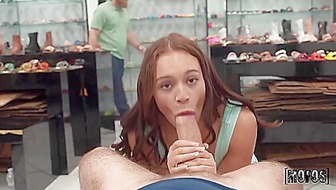 Big-assed brunette in pink dress riding a large cock