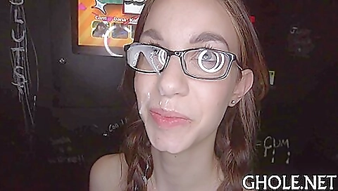 Busty brunette babe in red stockings gets a face-fuck