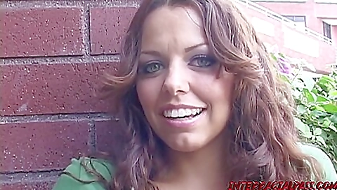 Brunette babe with an athletic figure is on a road with a stud